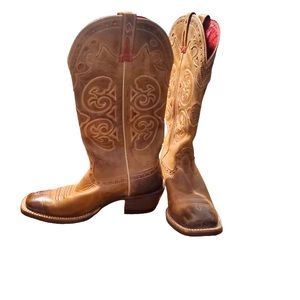 Woman’s tan with red stitching Ariat cowboy boots